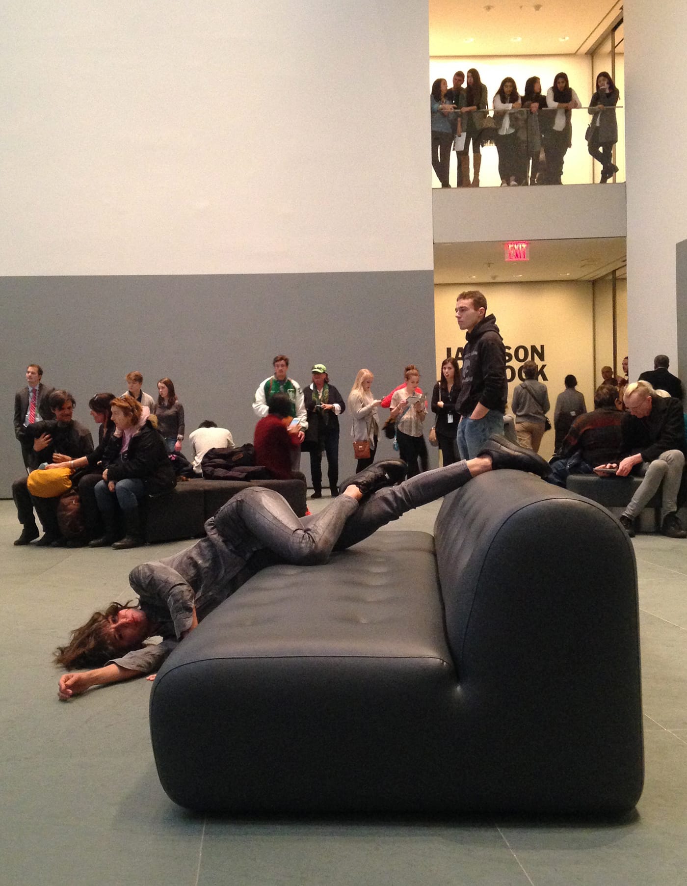 A dancer performing Maria Hassabi's 'PLASTIC' at MoMA in March (photo by the author for Hyperallergic)
