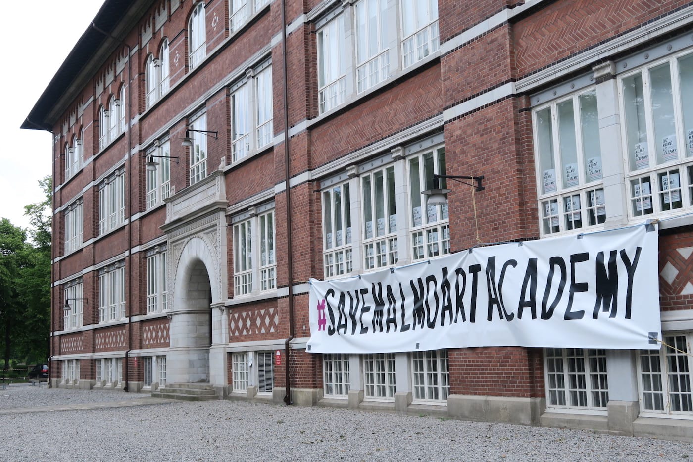 The exterior of the Malmö Art Academy with a banner