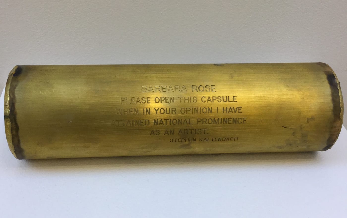 Stephen Kaltenbach, "Barbara Rose Time Capsule (Self Appropriation)" (1970), present brass and unknown contents, 3 x 10 1/2 x 3 in (all photos by the author for Hyperallergic)