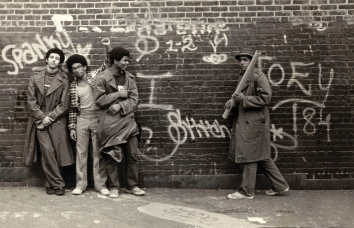 SNAKE 1, STATIC 5, FLASH 191, and STITCH 1 at the P.S. 189 school yard in Washington Heights, New York. Circa 1973. From the film "Wall Writers (Photo courtesy SNAKE 1, via wallwritersthemovie.com)