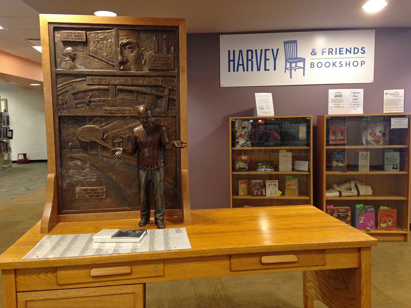 Harvey Pekar’s memorial statue, designed by Justin Coulter, and desk at the Cleveland Heights-University Heights Library (photo by the author for Hyperallergic) (click to enlarge)