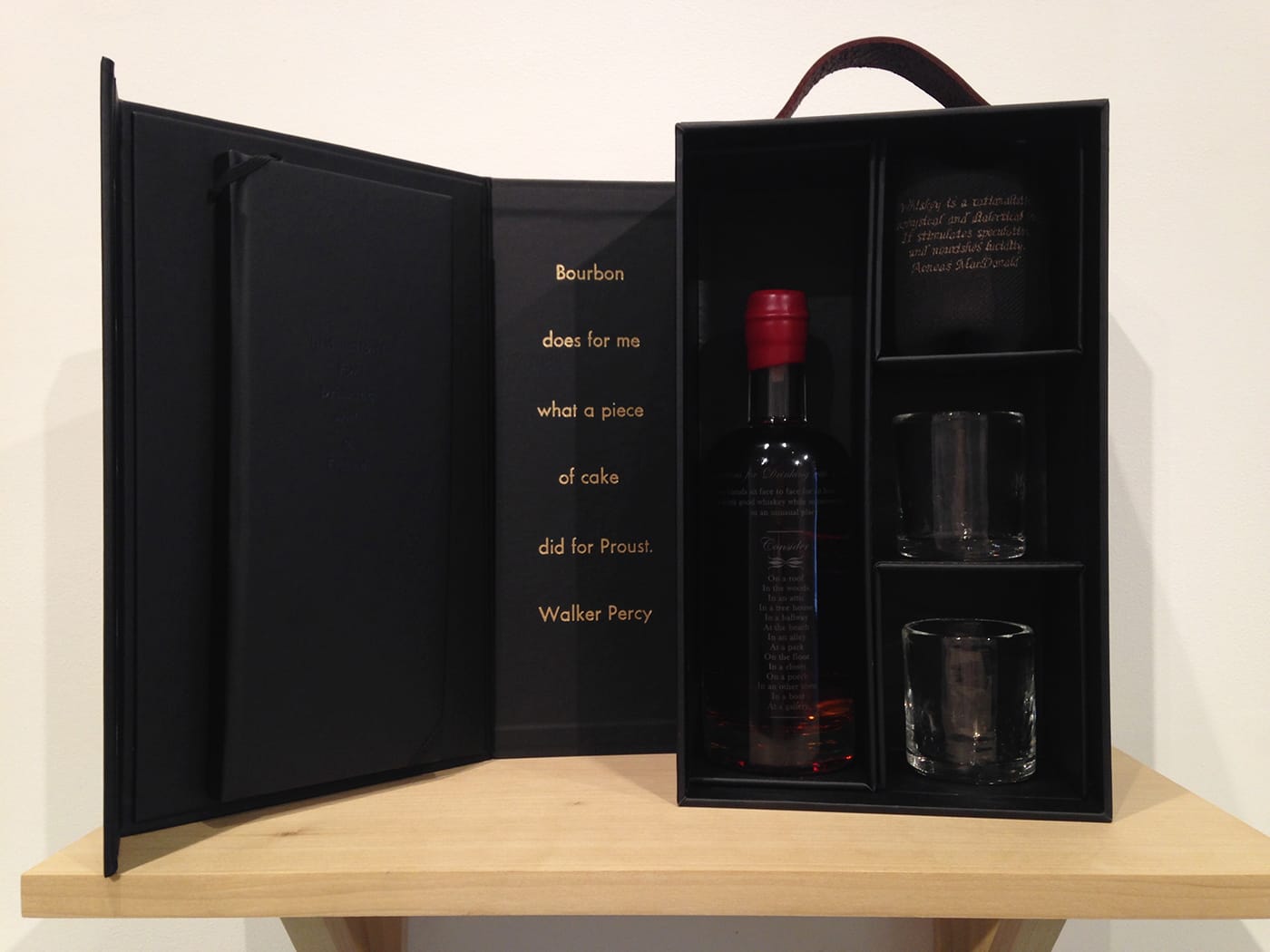 MK Guth, "MK Guth, Instructions for Drinking with a Friend" (2016), mixed media (2 hand-blown glasses, artist book, etched bottle of whiskey, embroidered bar cloth, and carrying case), 8 x 4 3/4 in (20.3 x 12.1 cm)