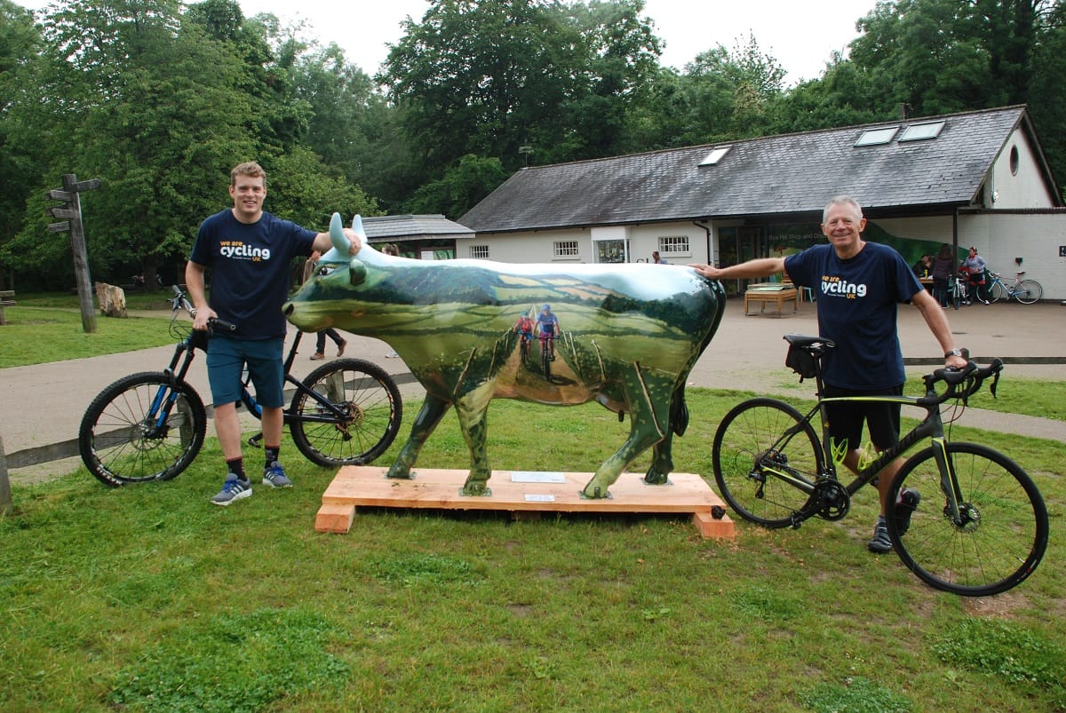"Cycling Moo Kay" with artist artist Charles Rowbotham (left) and Doug Clare (right) (photo courtesy Cycling UK)