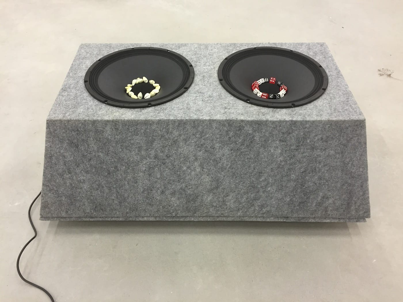 Vivian Caccuri, "Automotivo I" (2016), wood, carpet, subwoofer, dice, and shells