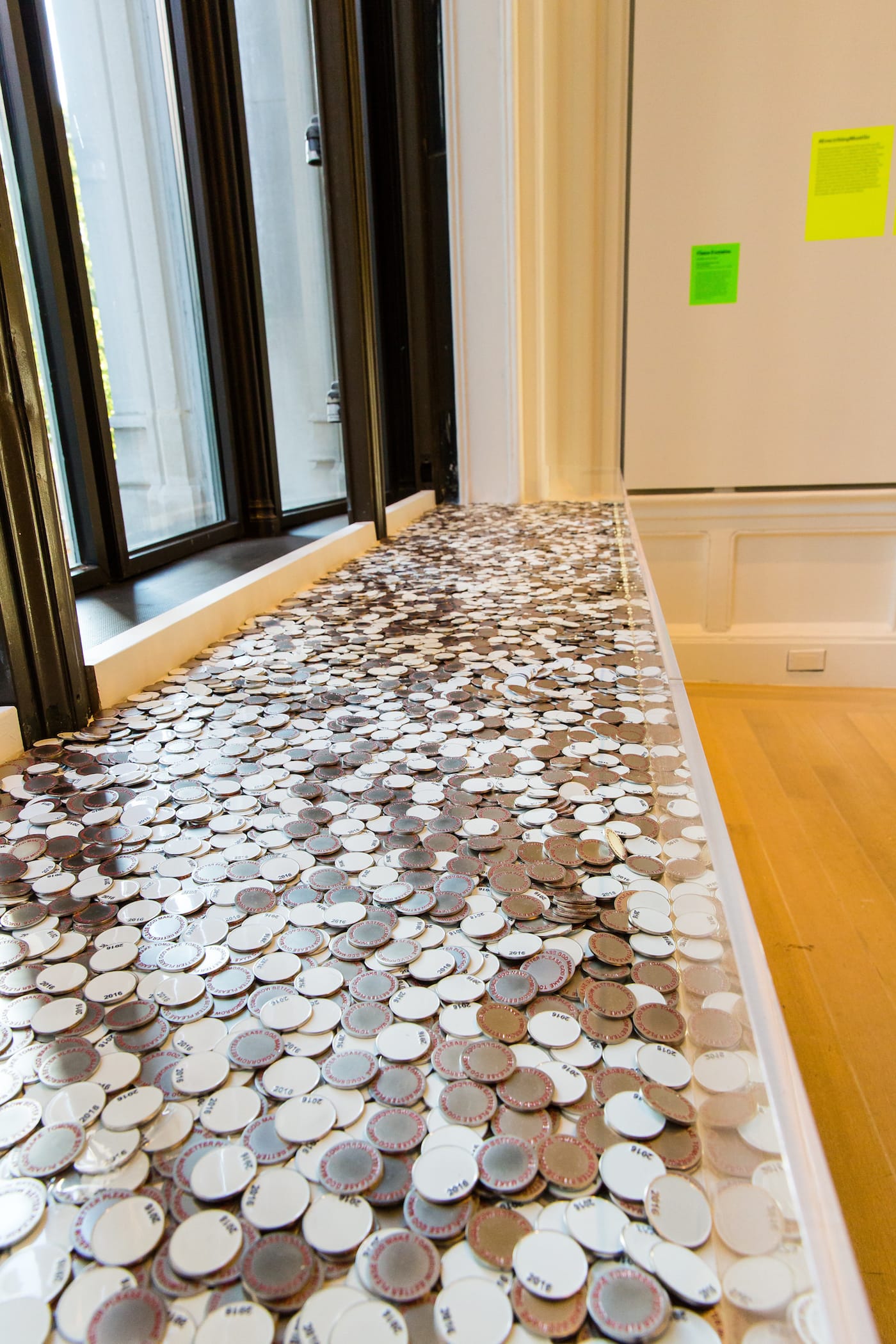 Claire Fontaine, Jeton (Please God), 2016, zinc and enamel. Courtesy of the artist and Gallery Neu, Berlin