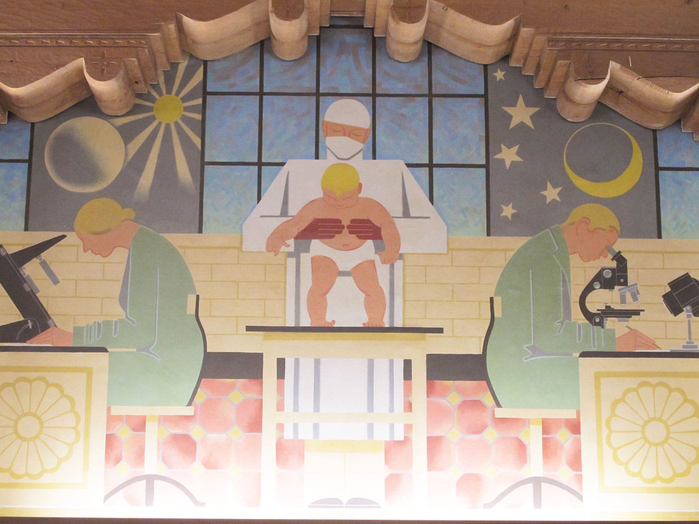 The third library mural, showing white scientists and a baby