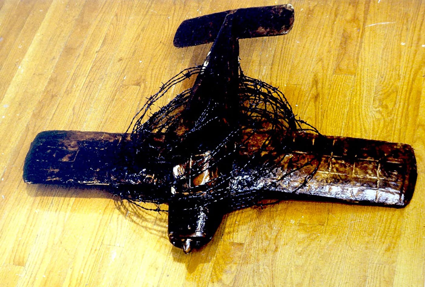 "Escape Plan 76 (Brer Plane in the Brier Patch)" (1996) - One of five airplanes on view