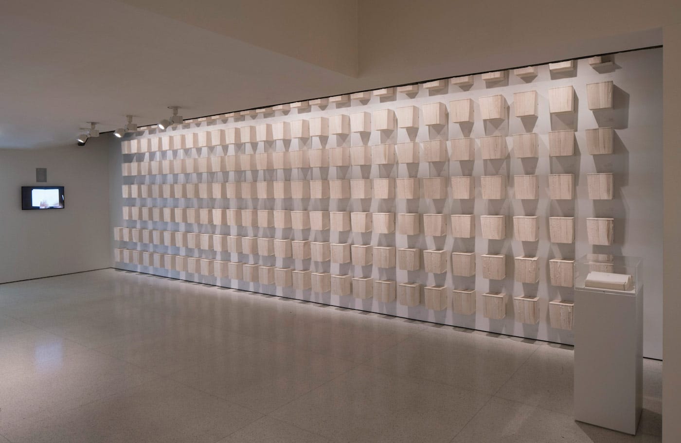 Joana Hadjithomas and Khalil Joreige, "Latent Images" (2015), 354 copies of printed artist’s book, 177 metal shelves, and color video, with sound, 120 min, Solomon R. Guggenheim Museum, New York, Guggenheim UBS MAP Purchase Fund 2015.88