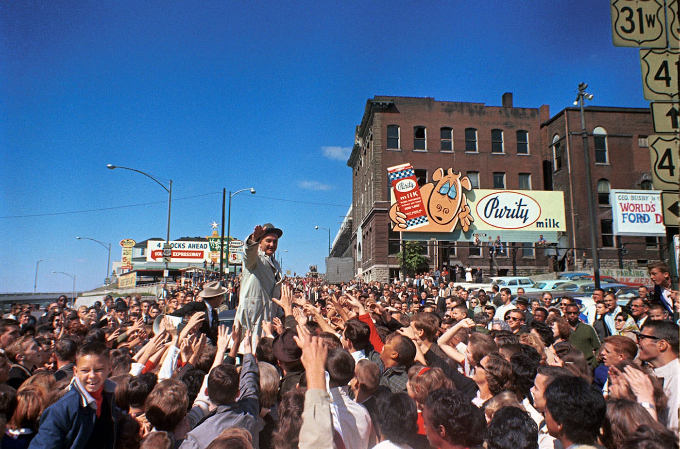 Cecil Stoughton, "President Lyndon B. Johnson campaigning, waving to the crowd" (October 1964) (courtesy LBJ Library)