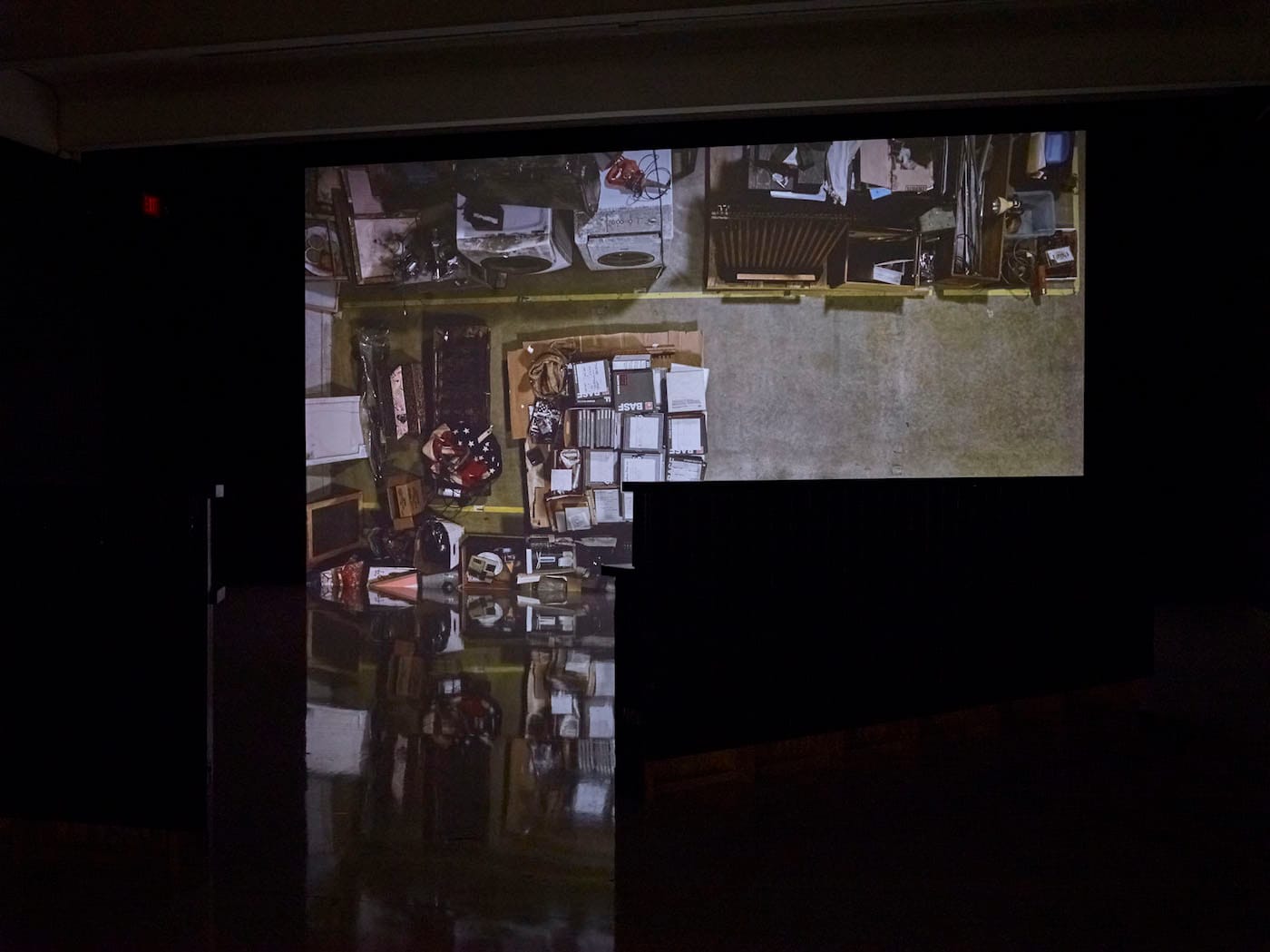 ex2016cl_ins Visual Arts, Exhibitions; installation views. Chris Larson - Land Speed Record Medtronic Gallery June 9, 2016 - January 8, 2017 Minnesota-based artist Chris Larson's video installation, Land Speed Record is titled after a live album by punk band Hüsker Dü, who rose to cult status in the 1980s. Larson’s project explores a group of objects that occupied his studio (a repurposed industrial warehouse space) for two years. These items originated from the childhood home of Grant Hart, Hüsker Dü’s drummer and co-songwriter, which caught fire and partially burned down in 2011. The smoke-blackened contents—furniture, appliances, antiques and collectibles, auto parts, rock-and-roll ephemera, art supplies, clothing, master tapes, musical instruments—had to be quickly cleared from the house to avoid repossession. Larson, a friend and collaborator of Hart’s, volunteered for them to be stored in his studio space. http://www.walkerart.org/calendar/2016/chris-larson-land-speed-record Curated by Siri Engberg and Doug Benidt