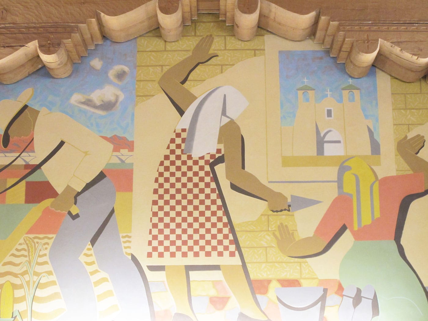 The second mural, showing Hispanic laborers