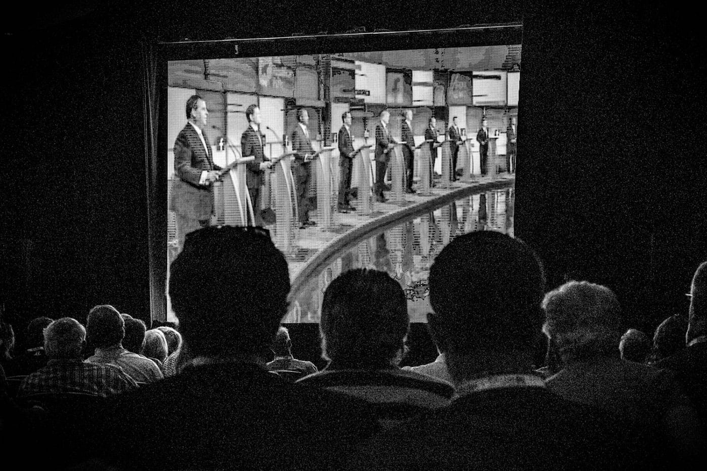 Mark Peterson, "Attendees at the RedState Gathering watch the first 2016 Republican presidential debate, ￼which took place in Cleveland, Ohio, Atlanta, GA" (August 6, 2016) (© Mark Peterson/Redux Pictures)