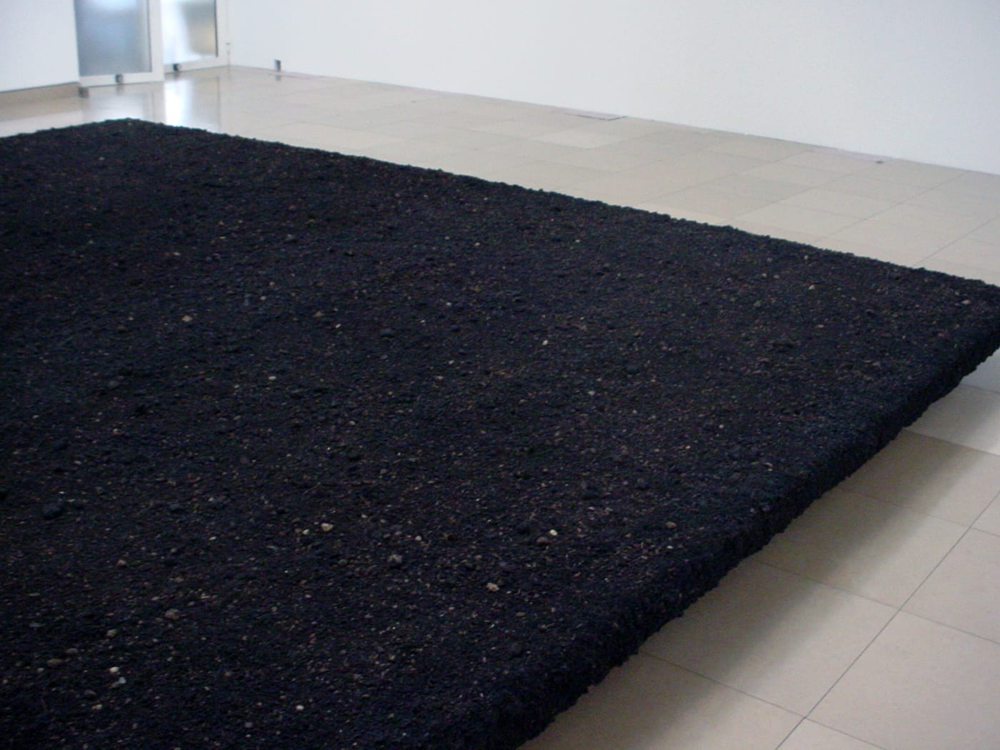 Ugo Rondinone, “elevated rectangle landscape” (2016), partial view, soil (photo by the author for Hyperallergic)