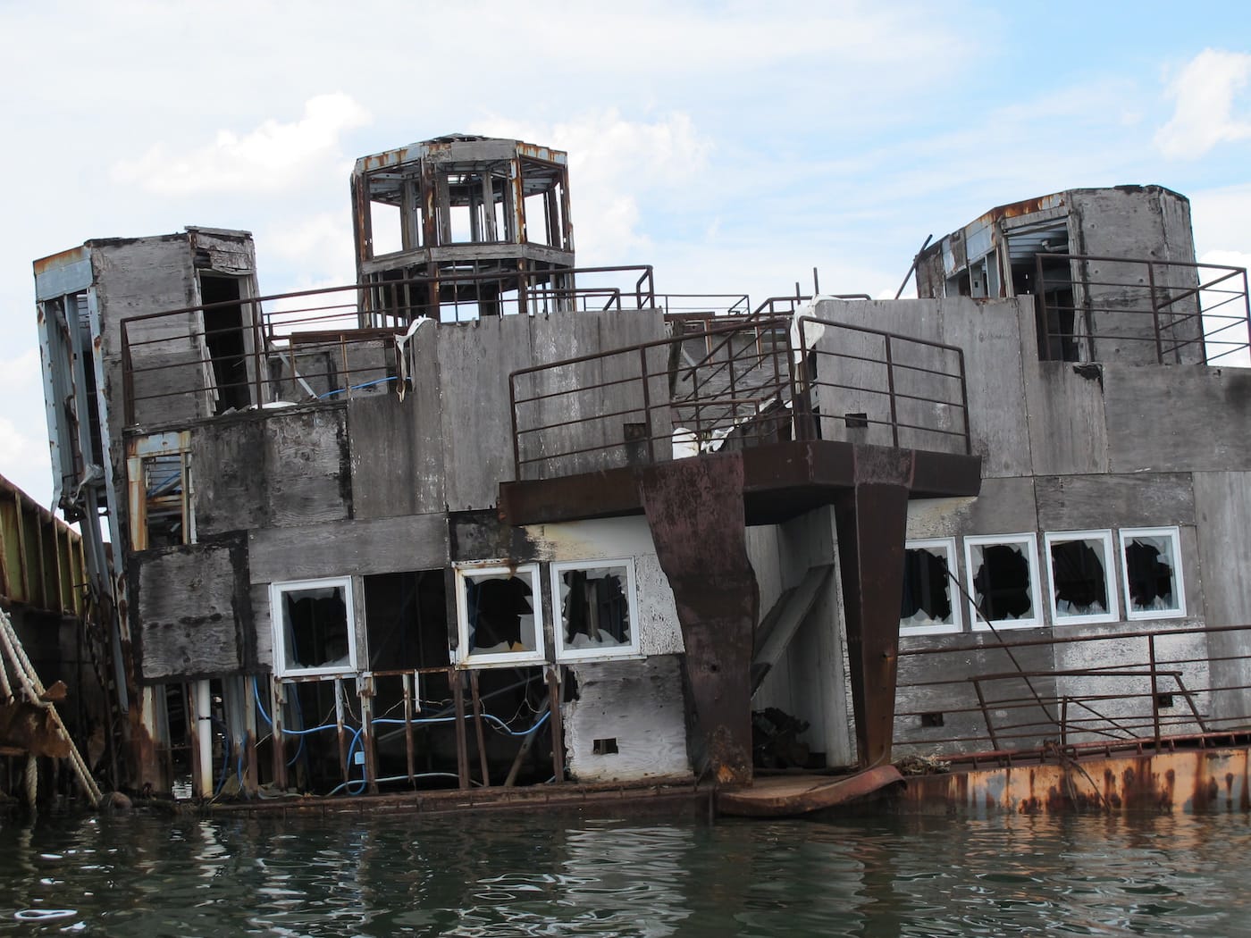 Elizabeth Albert with Marie Lorenz Party, "Barge in Deep Decline – Approach from The Tide and Current Taxi" (2005 – present), digital photograph. (courtesy of the artists)