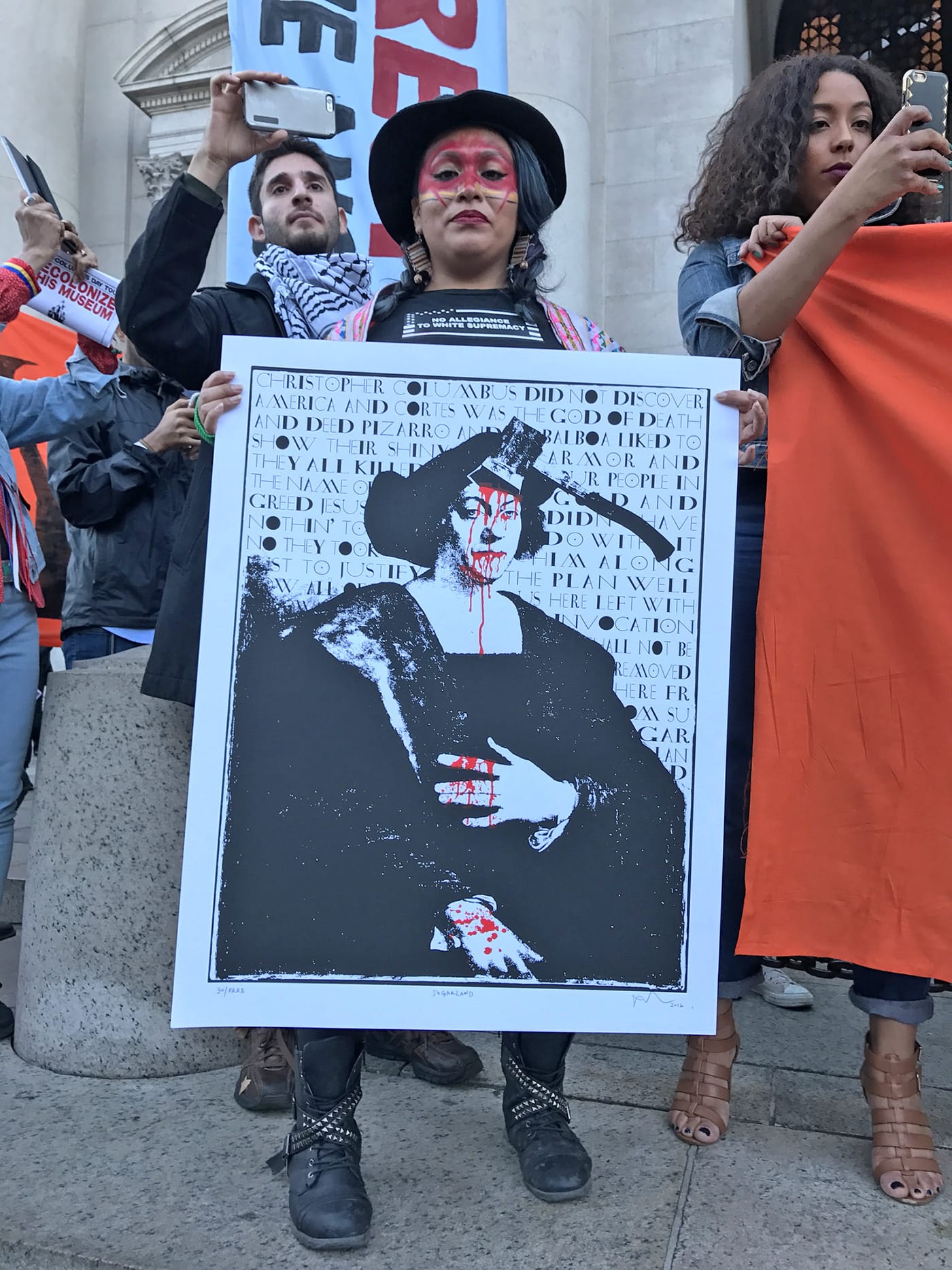 A protester outside the museum