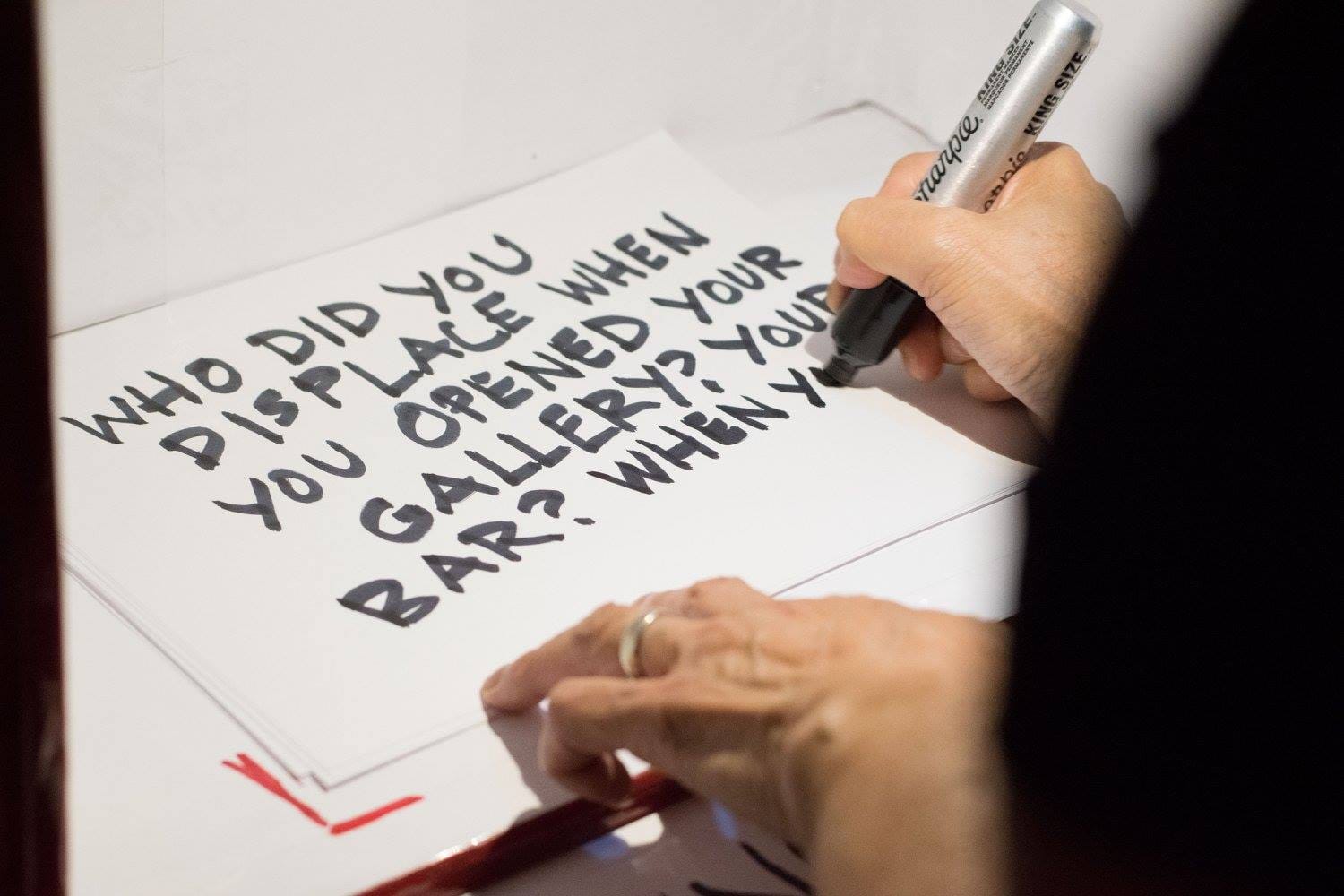 The public contributing to the projection campaign in Chinatown on September 24