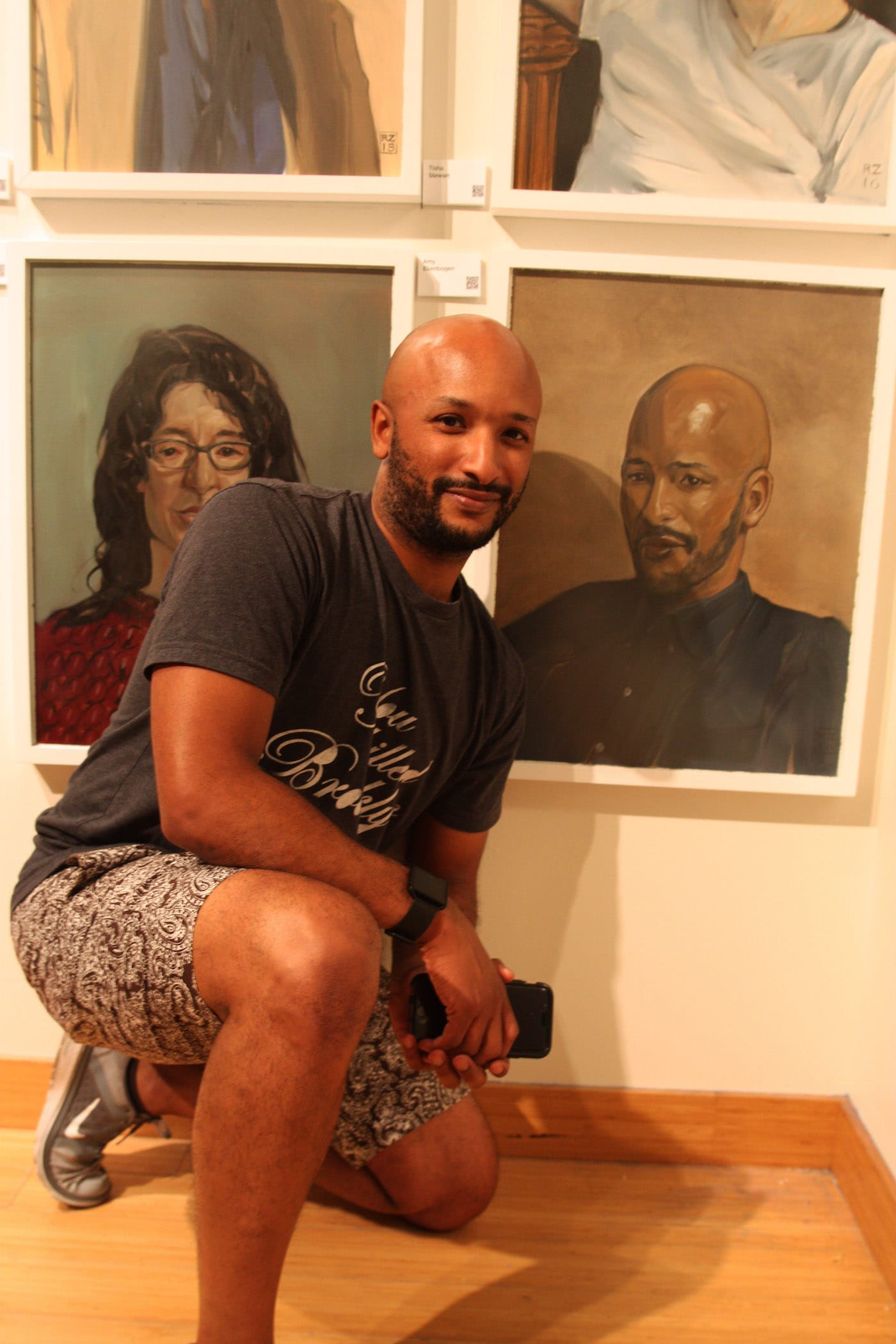 Carl Desir with his portrait
