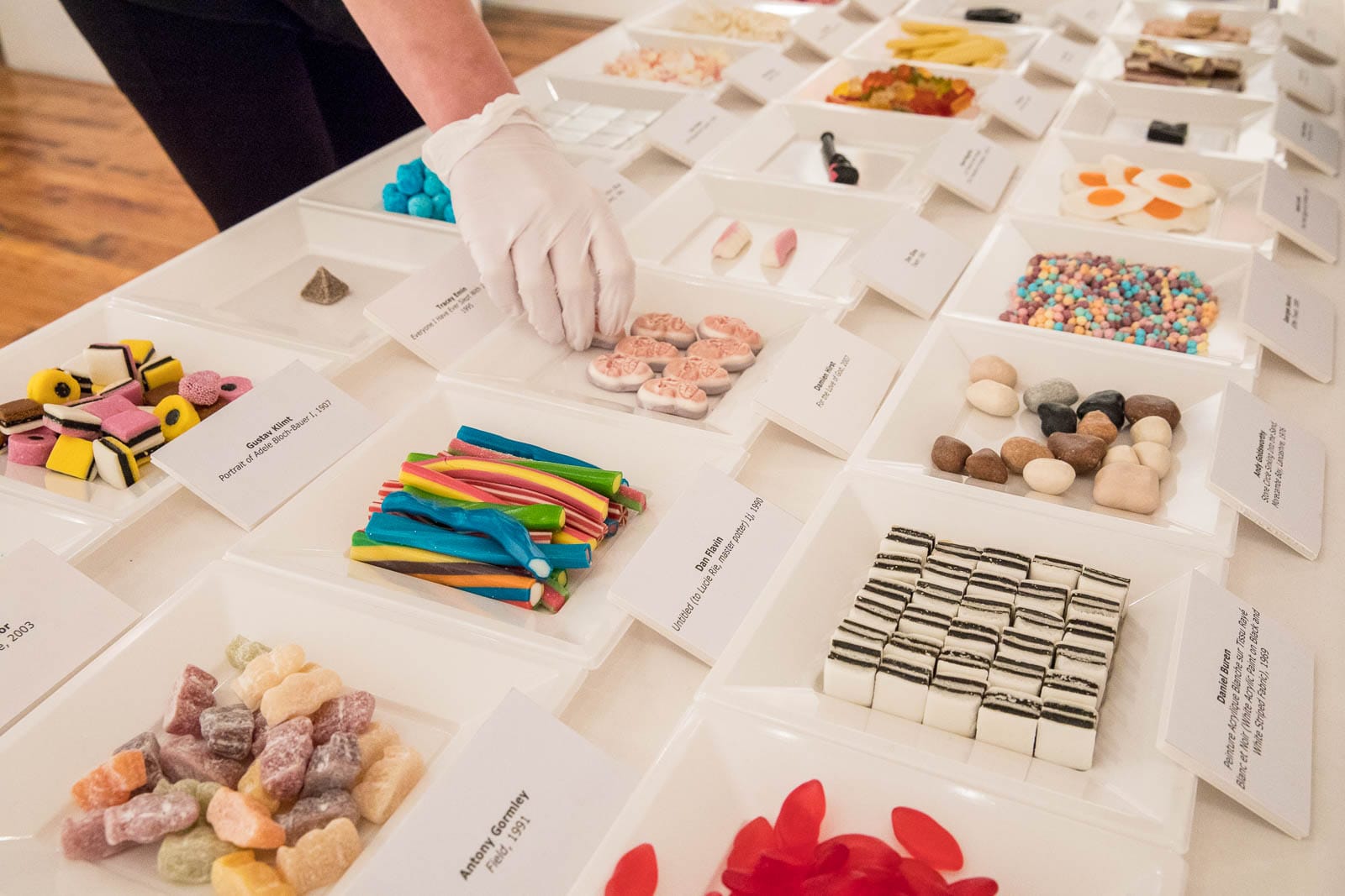 Artist Faye Scott-Farrington's Ate Gallery, which consisted of a table full of white square plates piled high with art-inspired snacks.
