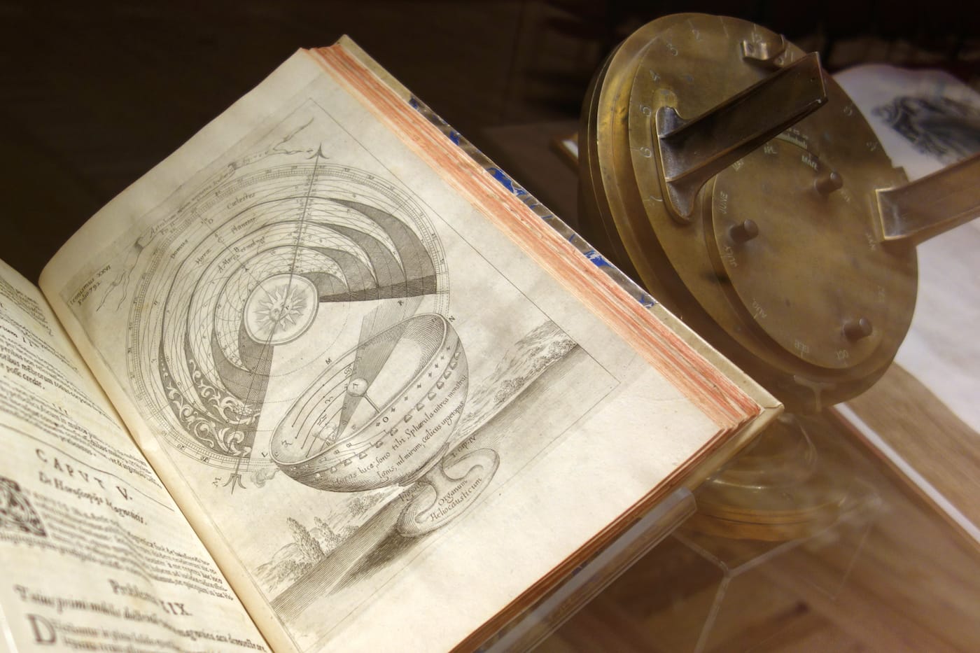 Installation view of 'On Time: The Quest for Precision. Books on Time and Timekeeping from the Linda Hall Library' at the Grolier Club (photo by the author for Hyperallergic)