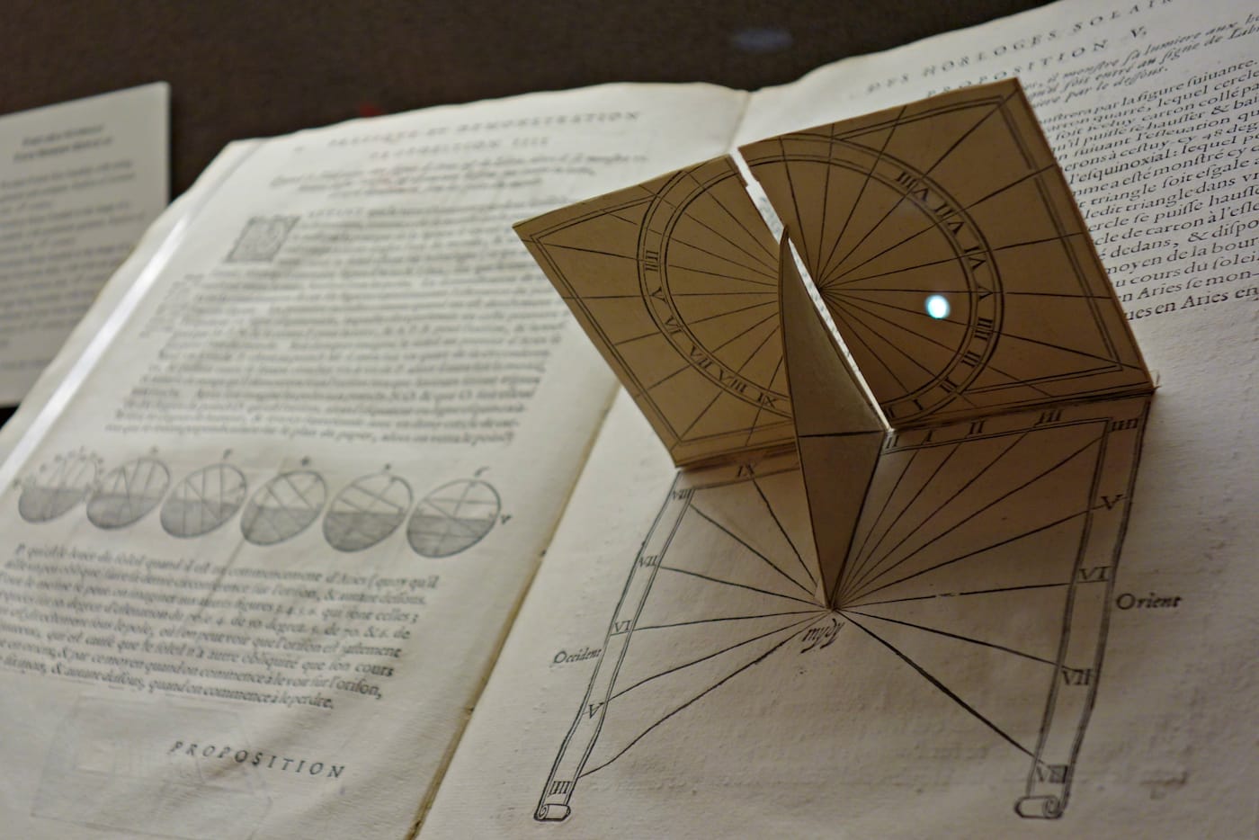 Installation view of 'On Time: The Quest for Precision. Books on Time and Timekeeping from the Linda Hall Library' at the Grolier Club (photo by the author for Hyperallergic)