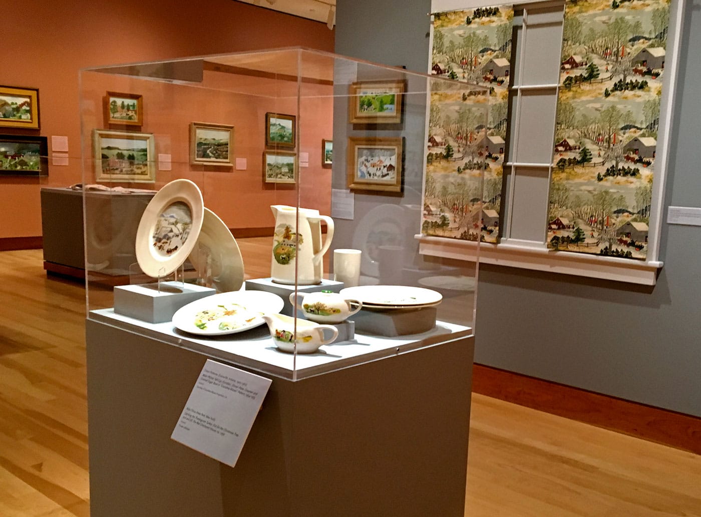 Installation view of 'Grandma Moses: American Modern,' showing Grandma Moses commercial products (photo by the author for Hyperallergic)