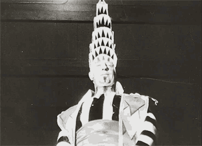 Architect William Van Alen dressed as the Chrysler Building, which he was in charge of designing, at the 1931 Beaux-Arts Ball (via National Archives/GIPHY)