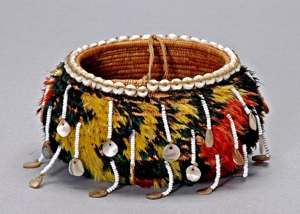 Pomo gift basket, early 20th century. Sedge, willow, glass beads, abalone shell, quail, mallard, canary, and woodpecker feathers (via theautry.org)