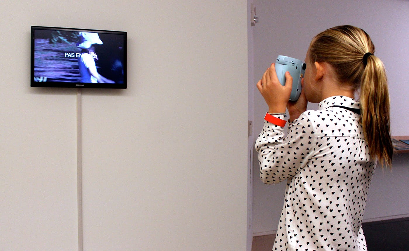 One of the Ethridge children, documenting a document of herself. 