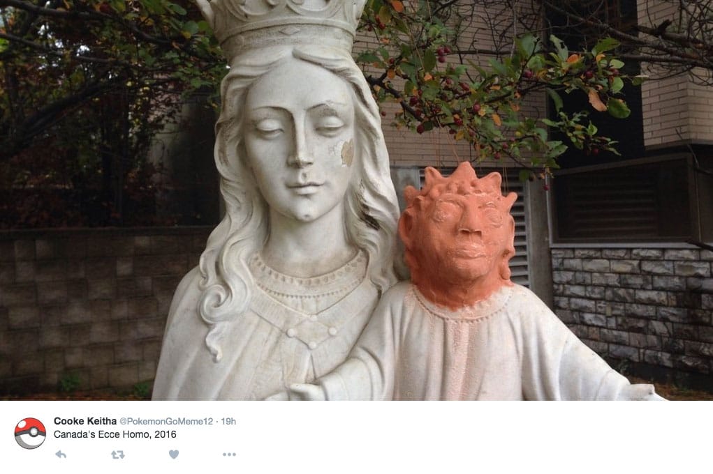 The new baby Jesus head in a churchyard in Sudbury (image via Twitter/PokemonGoMeme12)