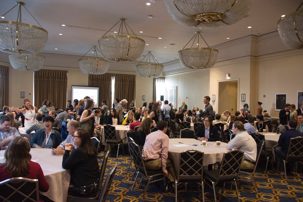 A networking session where strangers meet other strangers