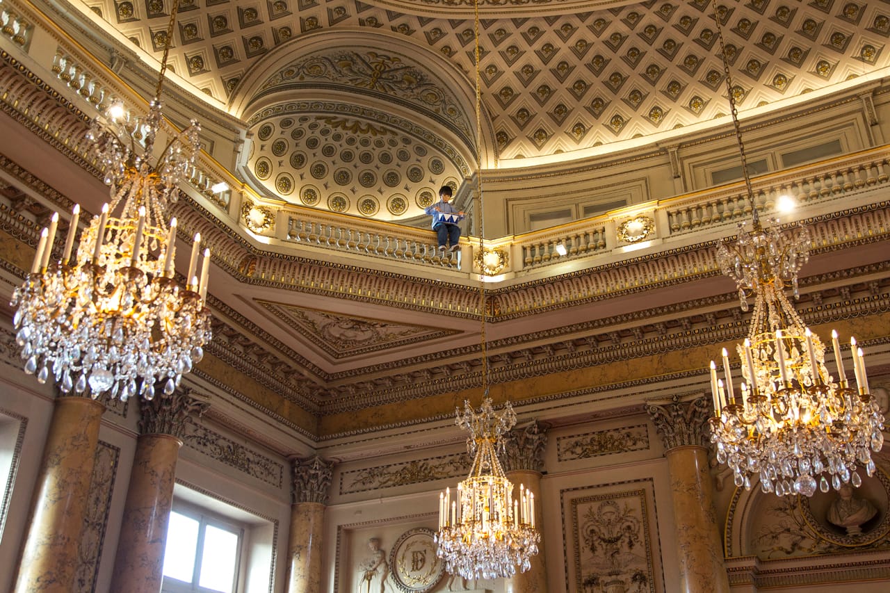 Maurizio Cattelan, "Untitled" (2003), resin, synthetic hair, clothes, shoes, electronic elements, steel drum (photo by Zeno Zotti)