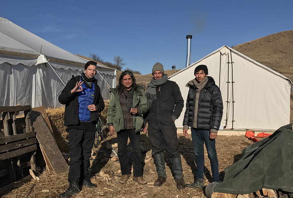 Artists (left to right) Jesse Hazelit, Raven Chacon, Ryan , and Cannupa Hanska Luger in the Art Tent area of Oceti Sekawan Camp, Standing Rock.
