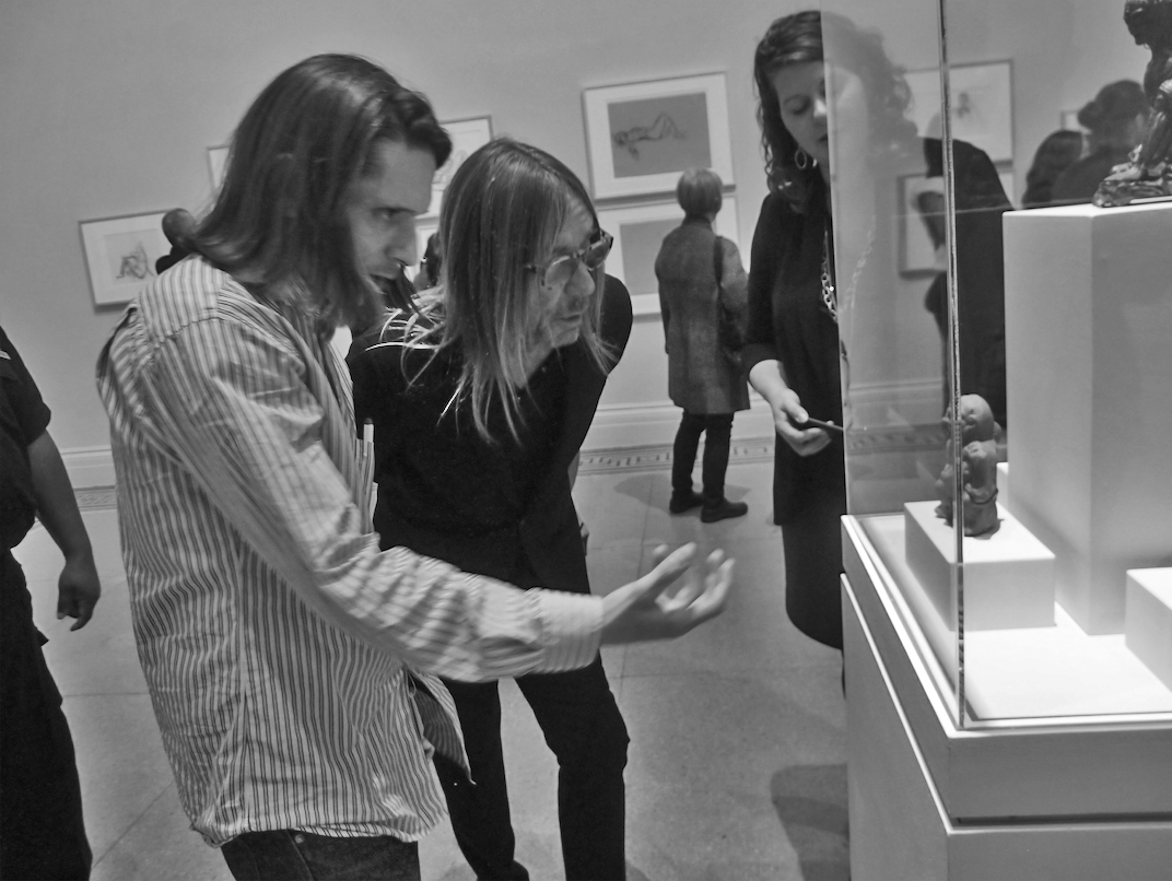 Jeremy Deller explains an ancient statue to Iggy Pop