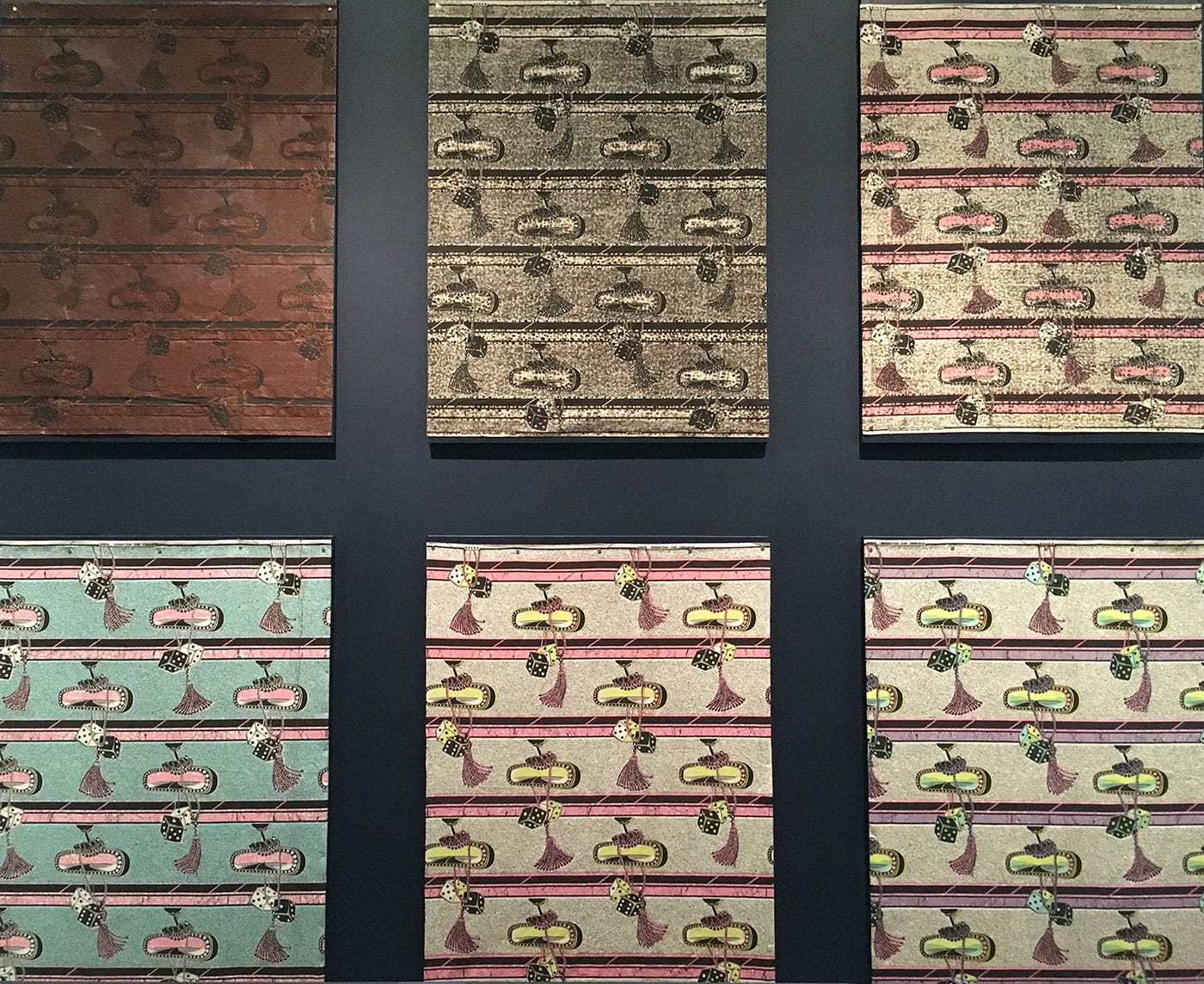 Blocks used in the process of making a Vlisco printed textile, on view in Vlisco: African Fashion on a Global Stage (photo by the author for Hyperallergic)
