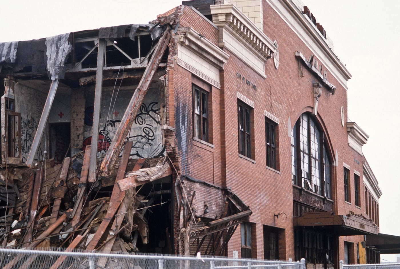 Andreas Sterzing, "Pier 34 Demolition (Wojnarowicz’s Gagging Cow and Richard Hambleton shadow painting are visible)" (1984) (courtesy the artist and Hunter College Art Galleries, New York)