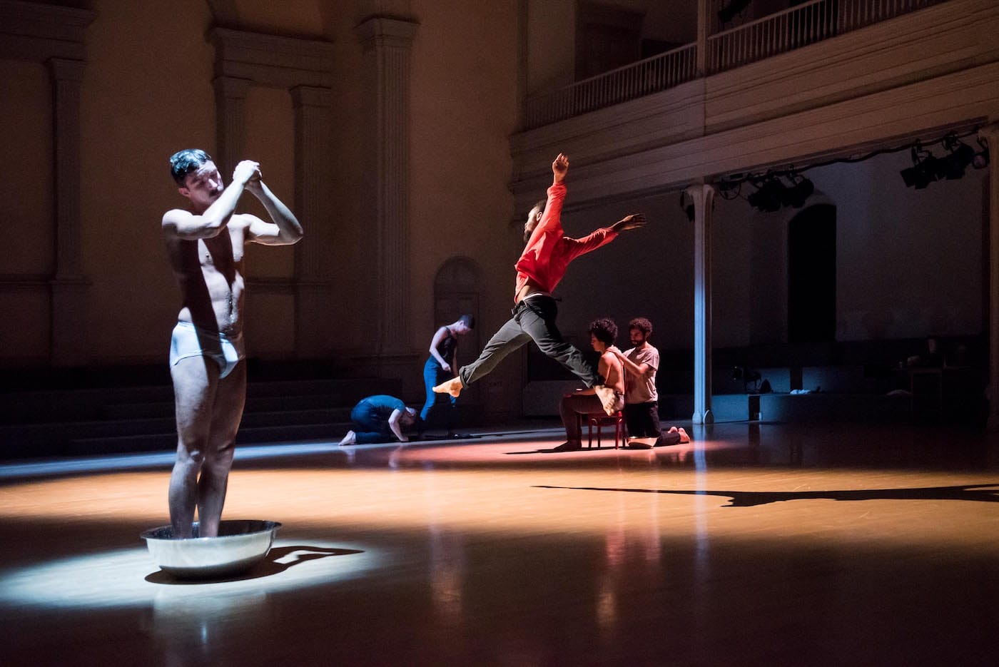 Left to right: Charles Gowin, Johnnie Cruise Mercer (leaping), Alex Rodabaugh, Talya Epstein, Madison Krekel, and Alvaro Gonzalez in Variations on Themes from Lost and Found: Scenes from a Life and other works by John Bernd, Danspace Project (photo by Ian Douglas, courtesy Danspace Project)