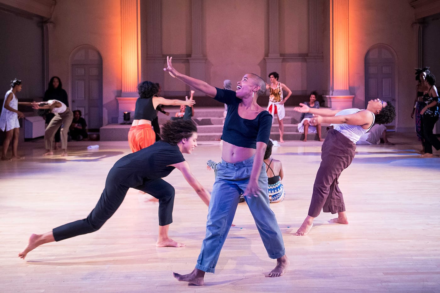 From left to right in the foreground: Tara Aisha Willis, Jasmine Hearn, and Sydnie L. Mosley. Performing in the skeleton architecture, or the future of our worlds, Danspace Project. Photo: Ian Douglas/courtesy Danspace Project.