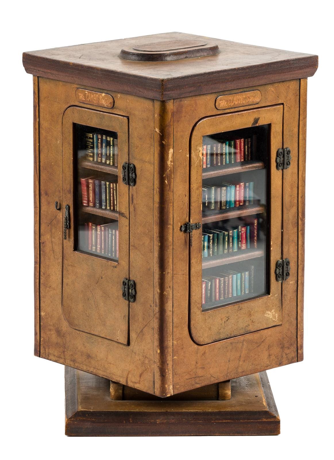 Collection of 151 miniature books by Barbara Raheb in a custom revolving case (1977-1980)