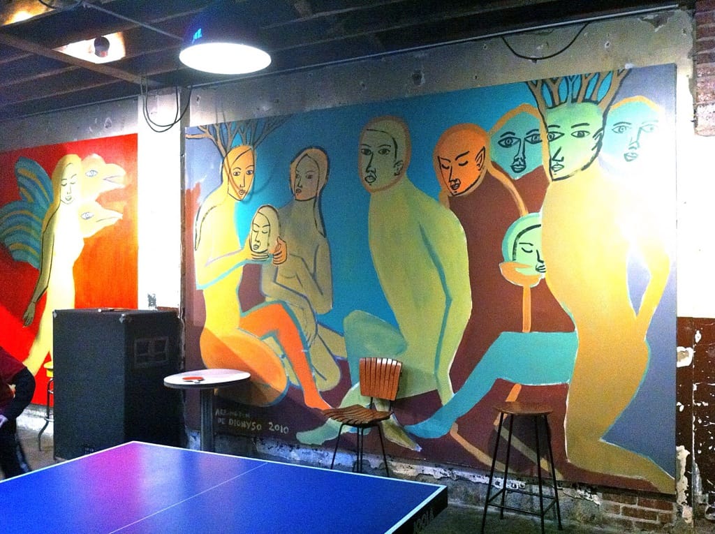 Arrington de Dionyso's mural at Comet Ping Pong