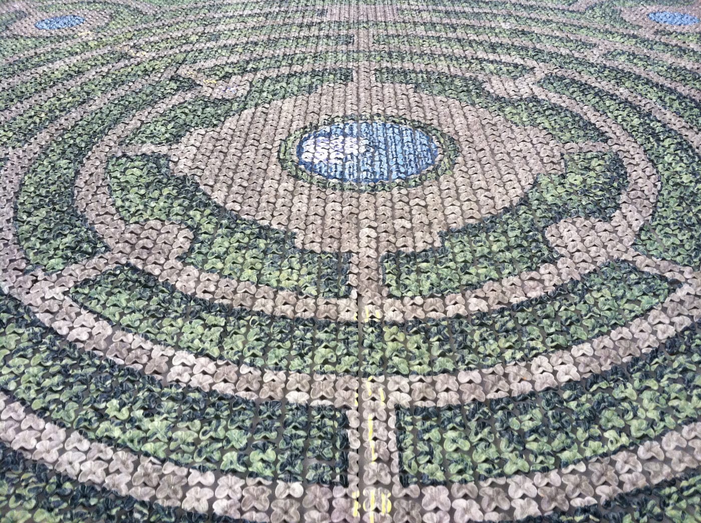 Detail of Kim Dickey, "Parterre" (2012), aluminum, glazed terracotta, silicone, and rubber grommets, 15 x 15 x 1 3/4 ft (photo courtesy the artist)