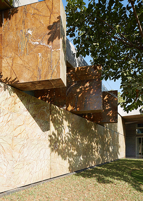 This house in India by Matharoo Associates transforms from an "impregnable shell" into a glass pavilion, allowing residents to vary the amount of light, ventilation and privacy in their home. (Dezeen)