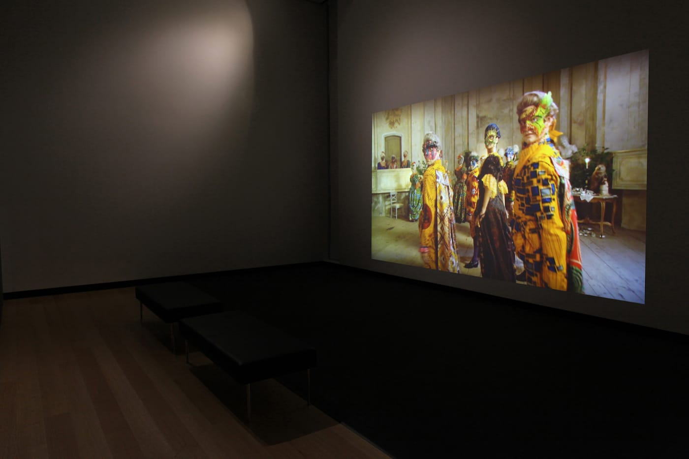 Installation view of <em>Senses of Time: Video and Film-Based Works of Africa</em> at the Ruth and Elmer Wellin Museum of Art, featuring Yinka Shonibare video (courtesy of the Ruth and Elmer Wellin Museum of Art)