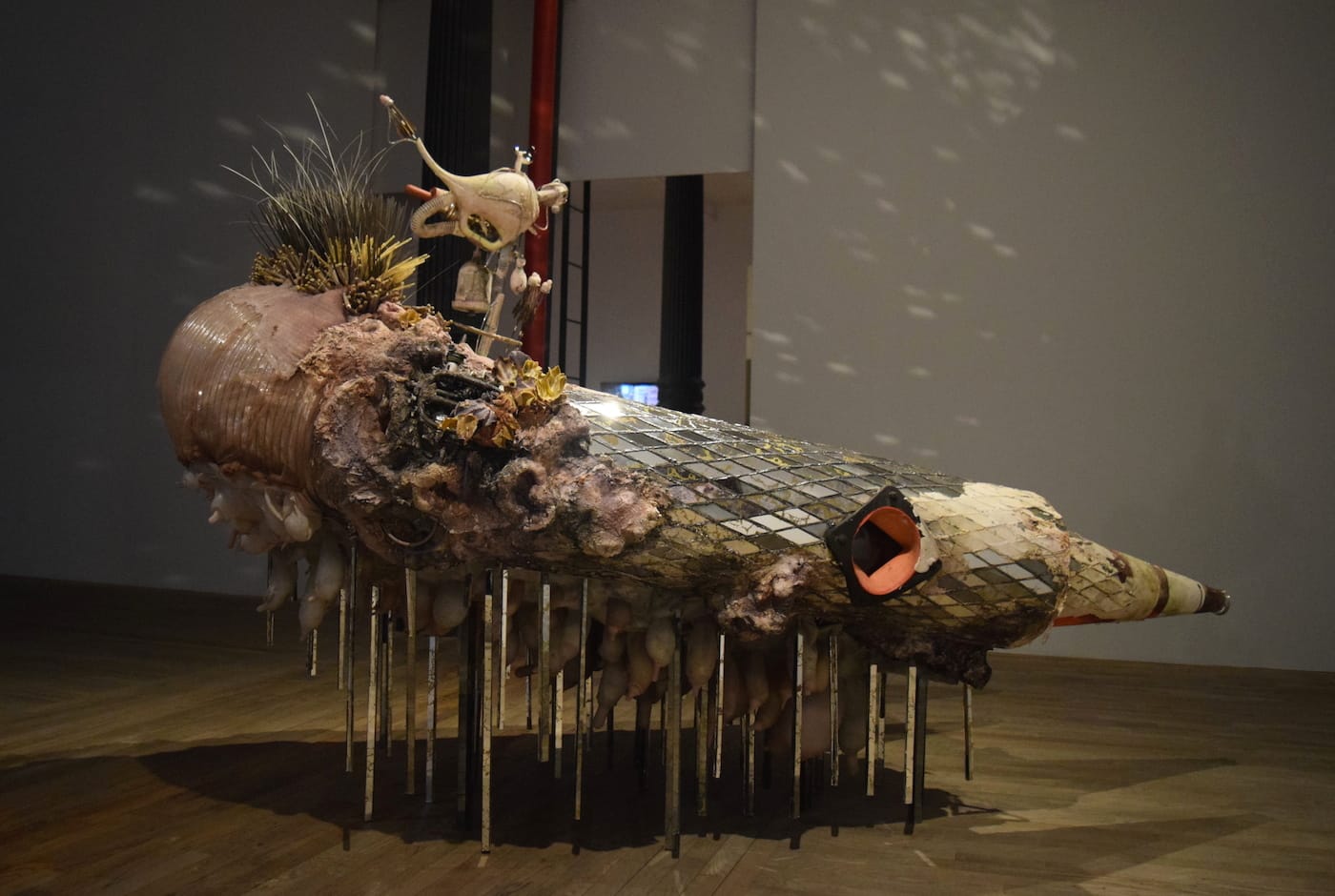 Monica Cook, "The Receiver" (2016), silicone, mirror, steel, barnacles, safety cones, acqua resin, sea urchin spines, coolant tank, resin, telephone cord, rubber tubing, 67 x 103 x 60 in