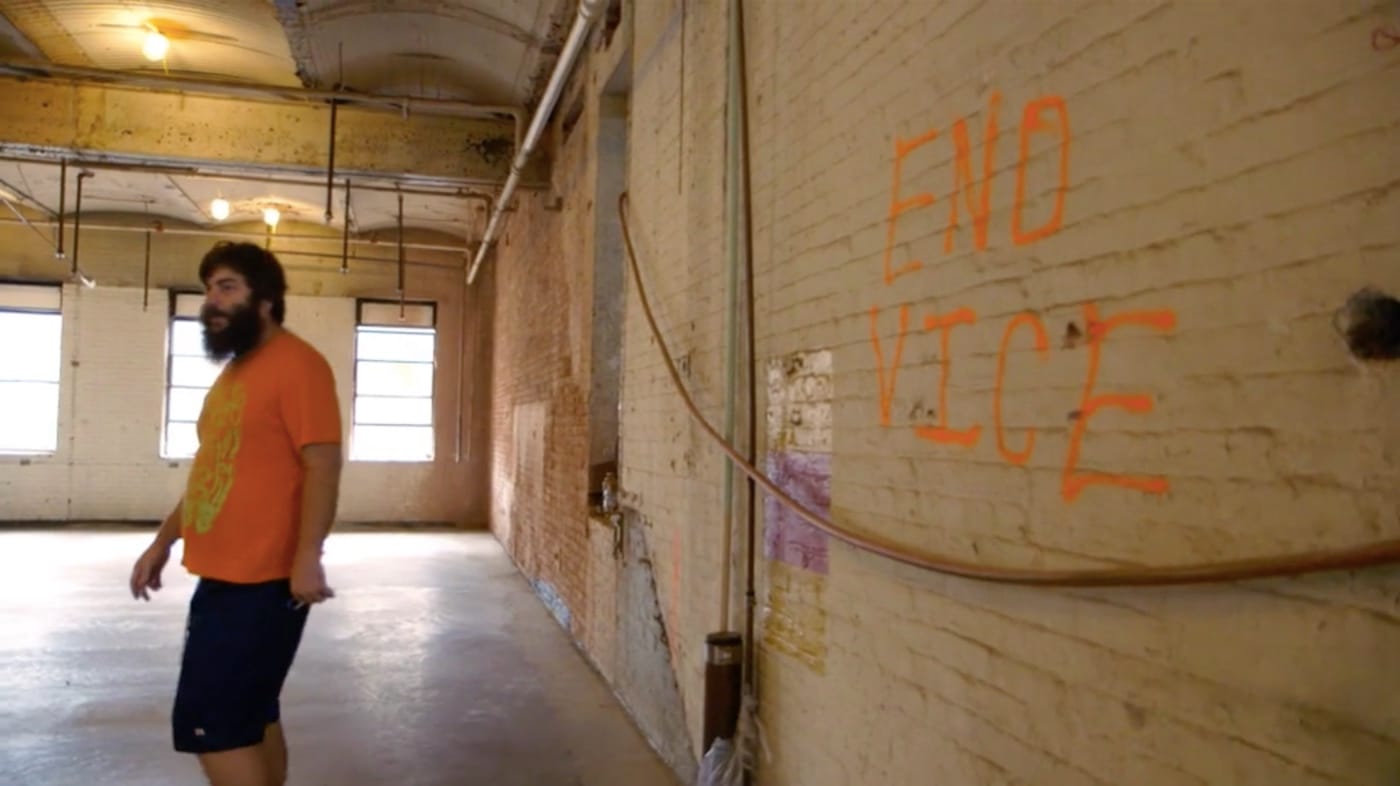 Edan Wilber in the space that became Vice headquarters in a scene from Goodnight Brooklyn — The Story of Death By Audio (2016)