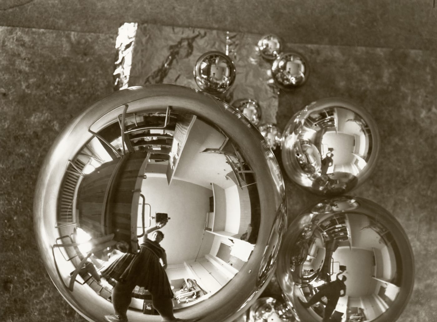 Marianne Brandt, “Self-portrait reflected in a Globe in Bauhaus Atelier” (1928–29) (© Bauhaus-Archiv Berlin / A.D.A.G.P. 2016)