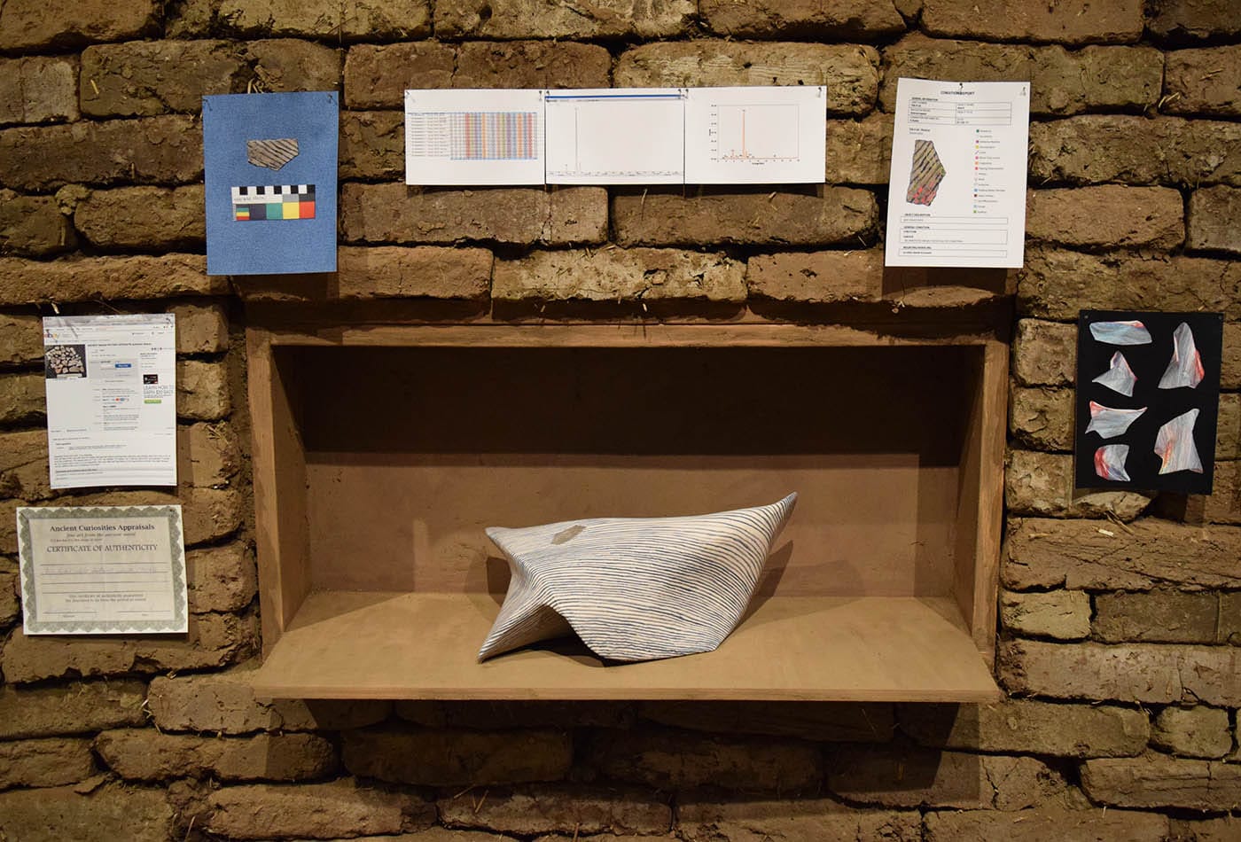 Gala Porras-Kim, "Reconstructed Southwest Artifact" (ca 900/2017), which is accompanied by documents detailing the artist's purchase of an authentic pottery shard on eBay and the Whitney Museum's acknowledgment of his offer to gift it to the museum.