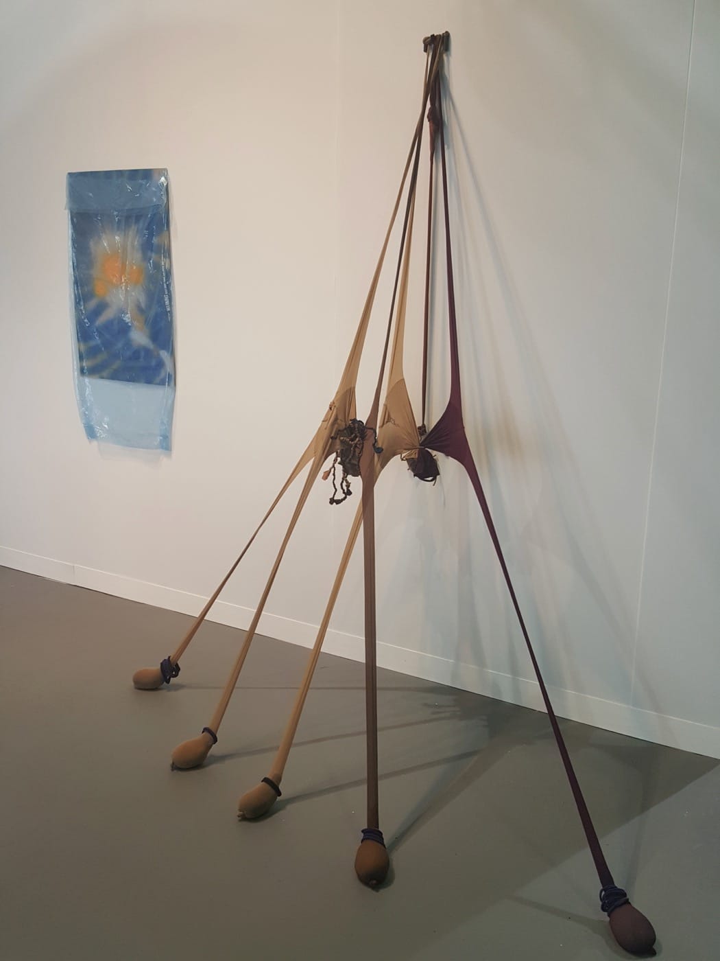 Senga Nengudi, "Eggactly" (1996, left) and "R.S.V.P. Reverie 'Scribe'" (2014, right), in the booth of Thomas Erben Gallery
