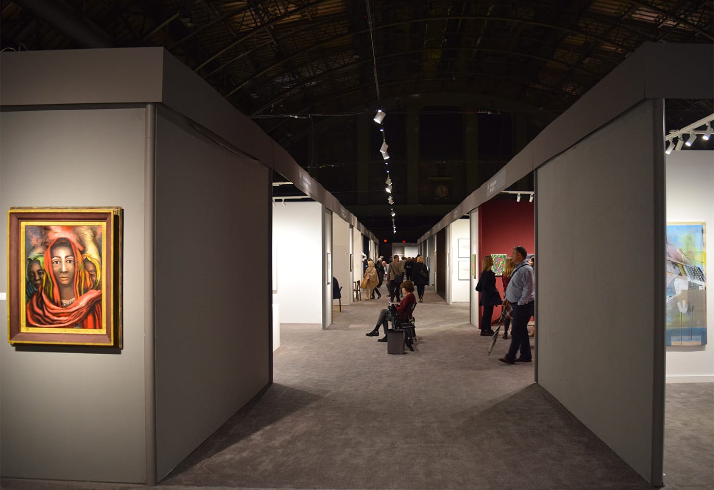 One of the main aisles at the 2017 ADAA Art Show, with David Alfaro Siqueiros's "La Patrona" (1939) in the Mary-Anne Martin Fine Art boot at left (all photos by the author for Hyperallergic)