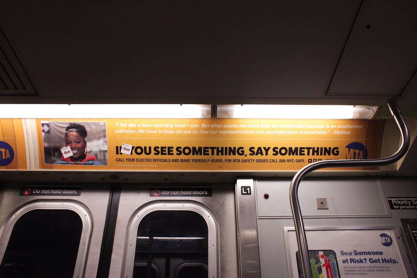 One of the substitute MTA ads, which reads: "I felt like a hero reporting what I saw. But what scares me more than an unattended package is an unattended politician. We have to keep an eye on how our representatives vote and hold them accountable."