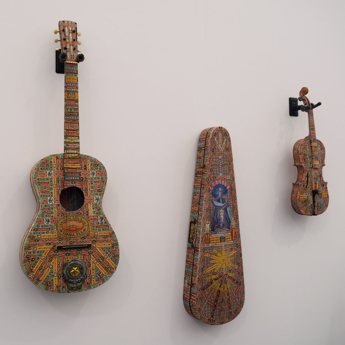 Collaged instruments by Felipe Jesus Consalvos in the Fleisher/Ollman booth
